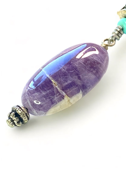 Buddha Head Amethyst on Corundum