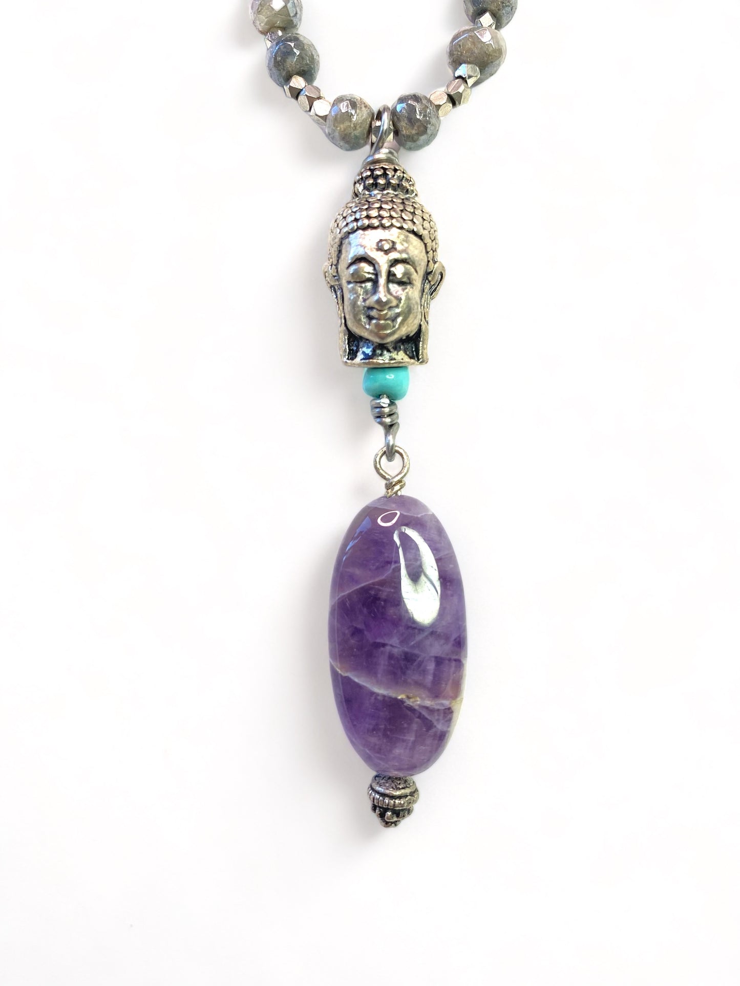 Buddha Head Amethyst on Corundum