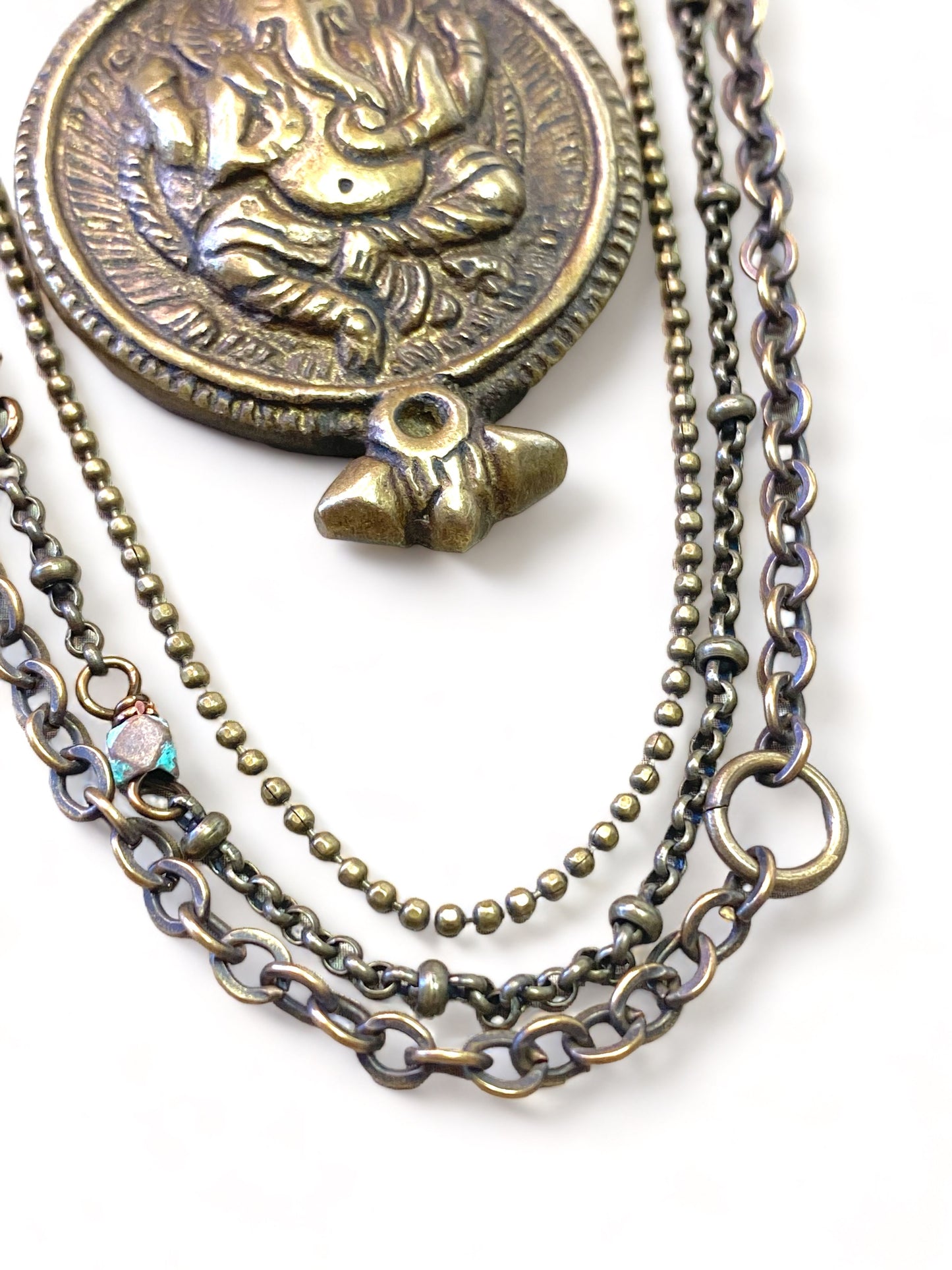 Brass Lid Ganesha on Chain