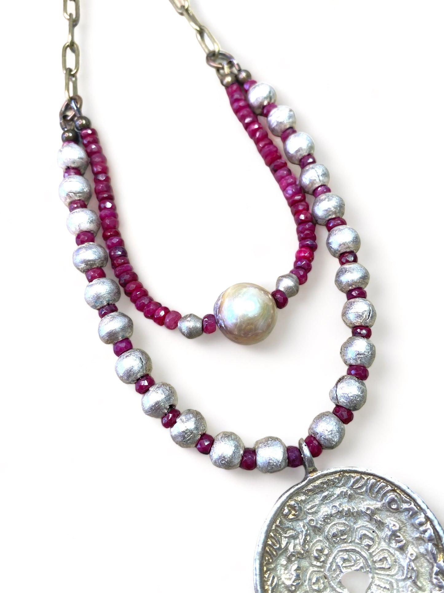 Silver Medallion on Rubies