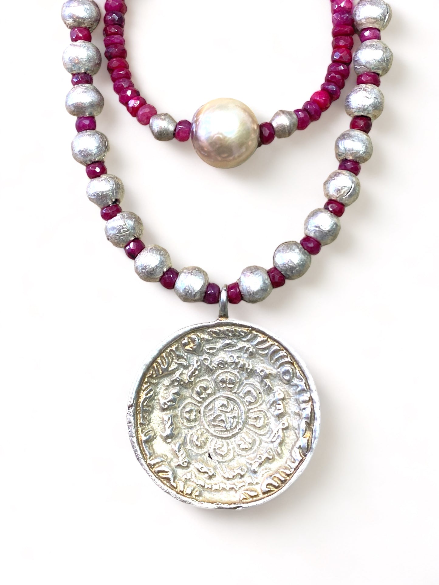 Silver Medallion on Rubies