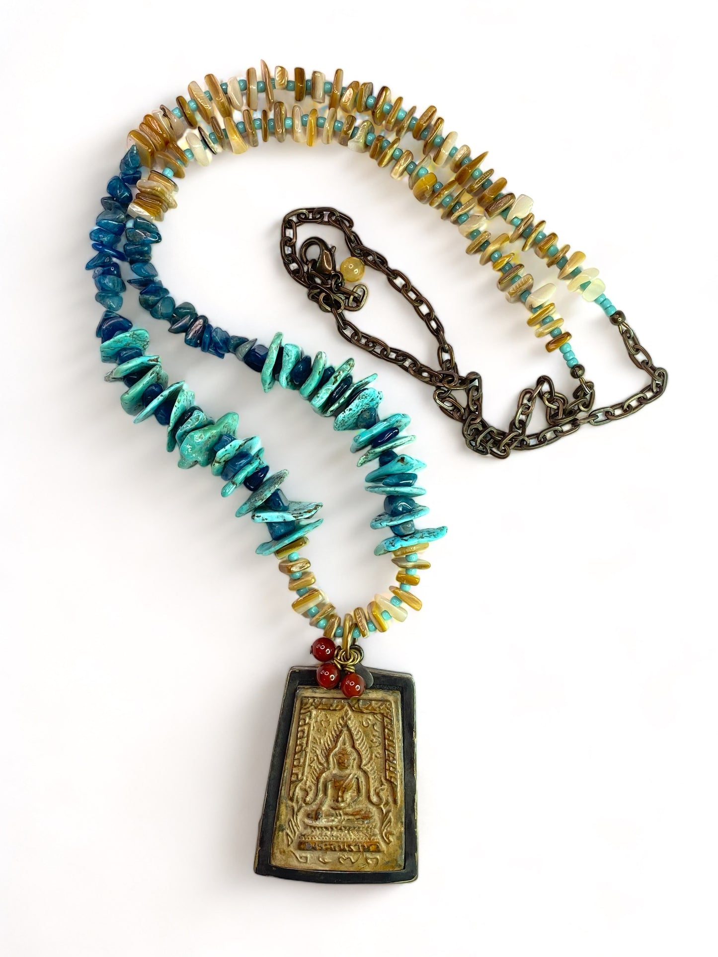 Wooden Buddha on Turquoise