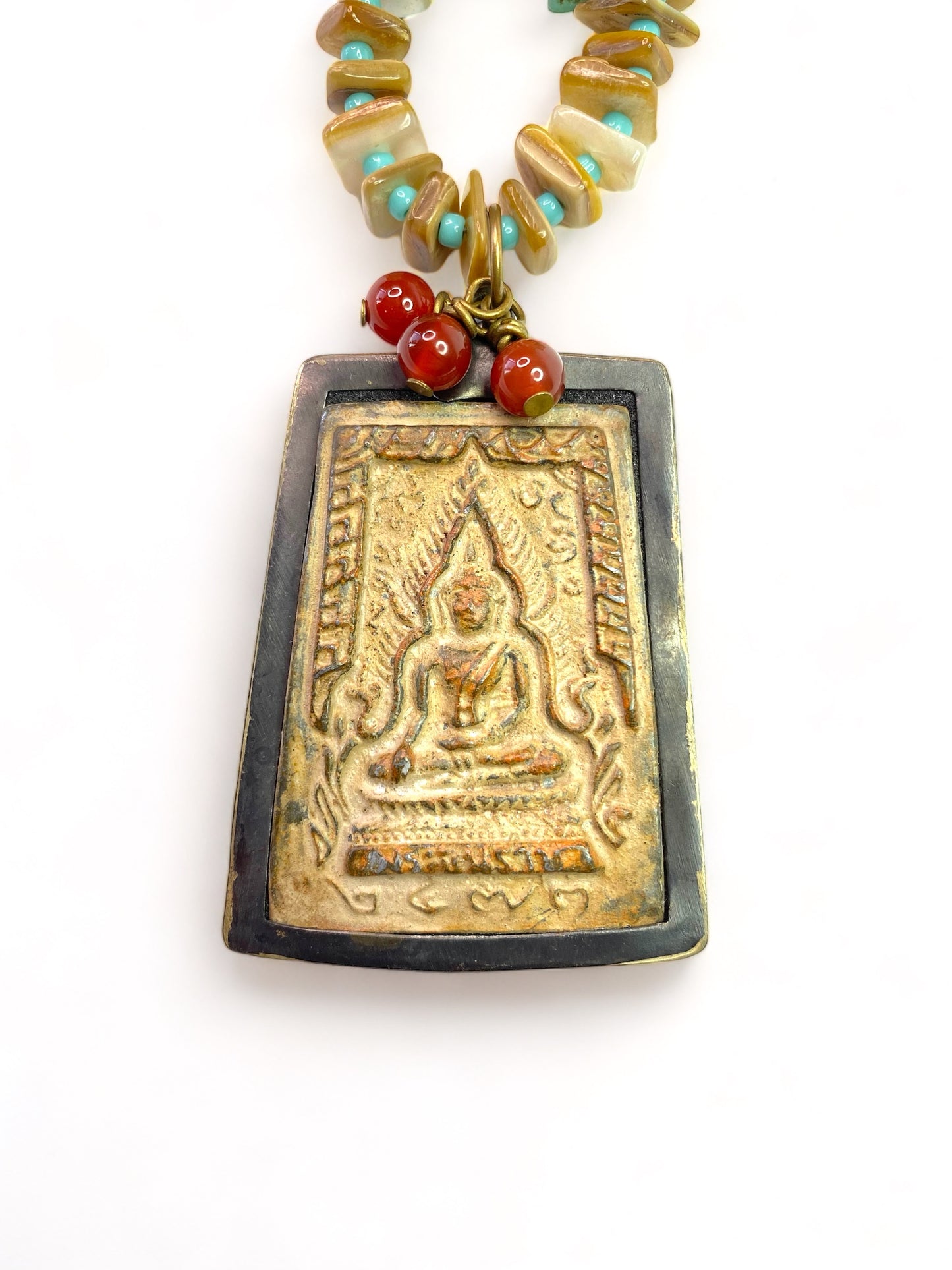 Wooden Buddha on Turquoise